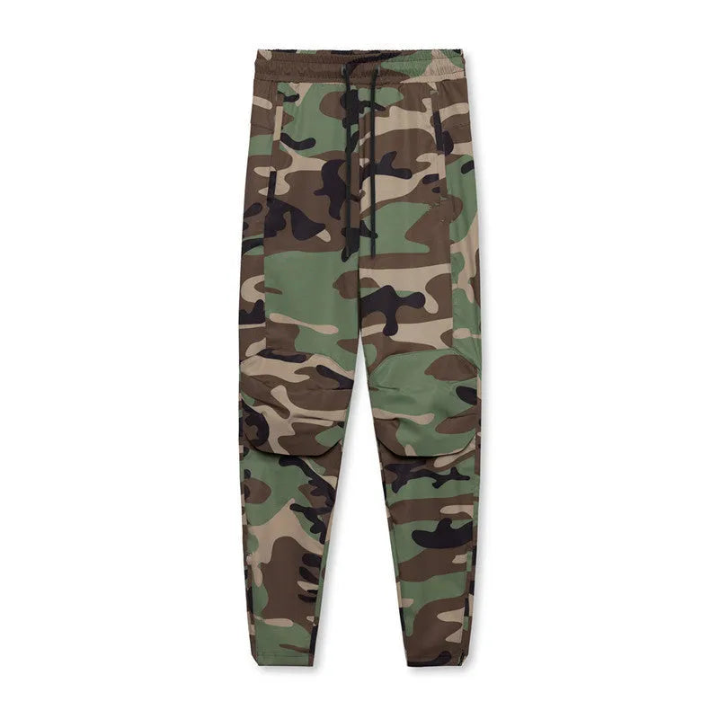 Men's ankle-tied loose fit running pants in a quick-dry fabric, shown in olive green colour.