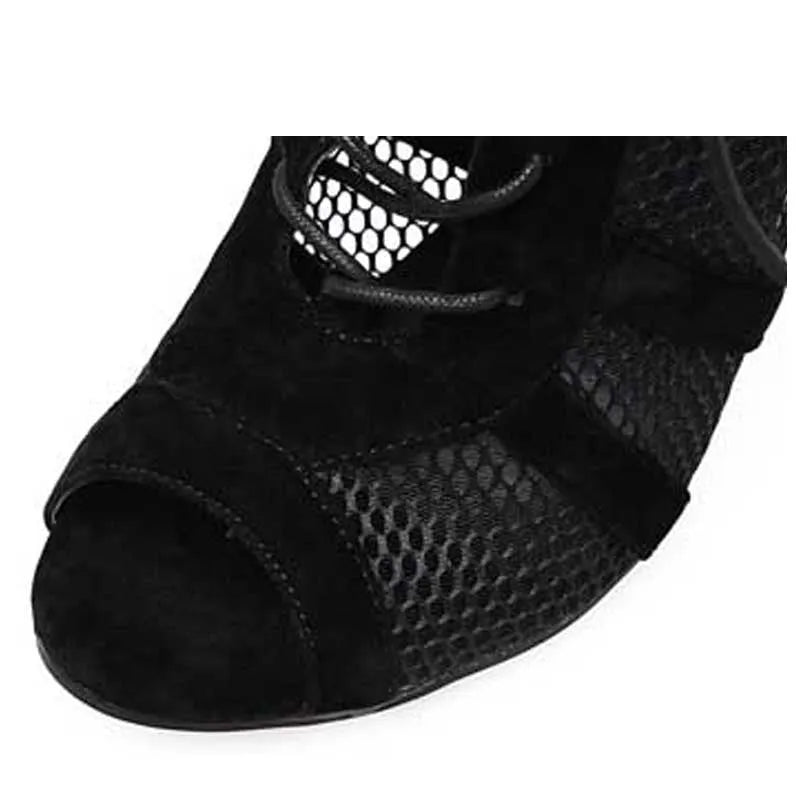 Black suede women's lace-up high heel shoes with 11.5cm heel shown from side view