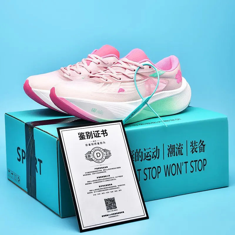 Low-top unisex racing sneaker with carbon plate, shown in Glacier colour with front lace-up detail.