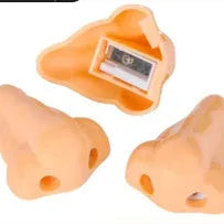 Flesh colour geometry plastic pencil sharpener with big nostril hole measuring 58x45x30mm