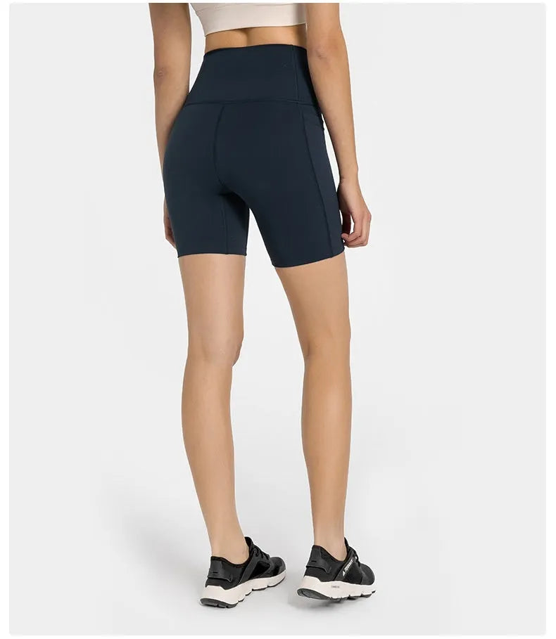Women's tight-fitting mid-length sports shorts in a cotton blend fabric for running and fitness.