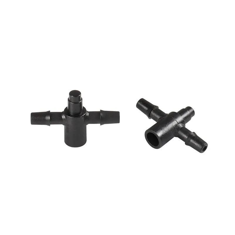White PE plastic tee water distributor connector for garden irrigation micro spray systems.