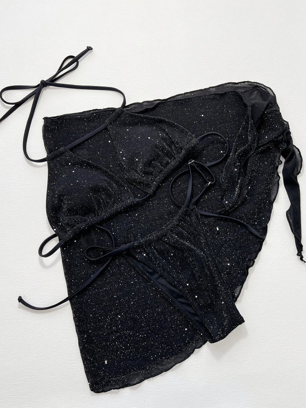 Black three-piece polyester bikini set with separate top and shorts