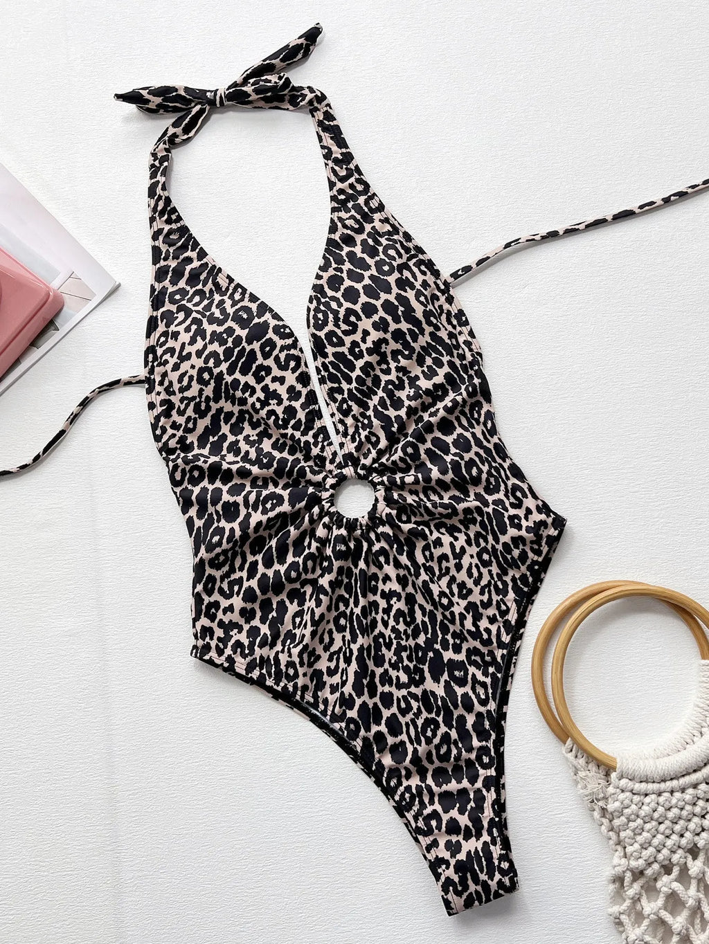 Leopard print one-piece swimsuit with hollow-out ring bikini design for women.