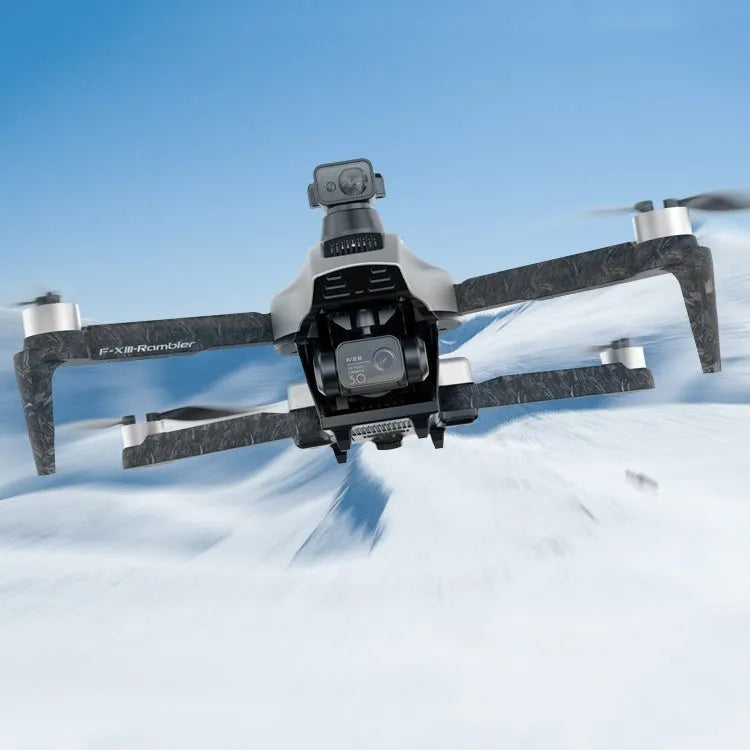 White folding quadcopter drone with camera, remote controller, batteries, and shoulder bag.