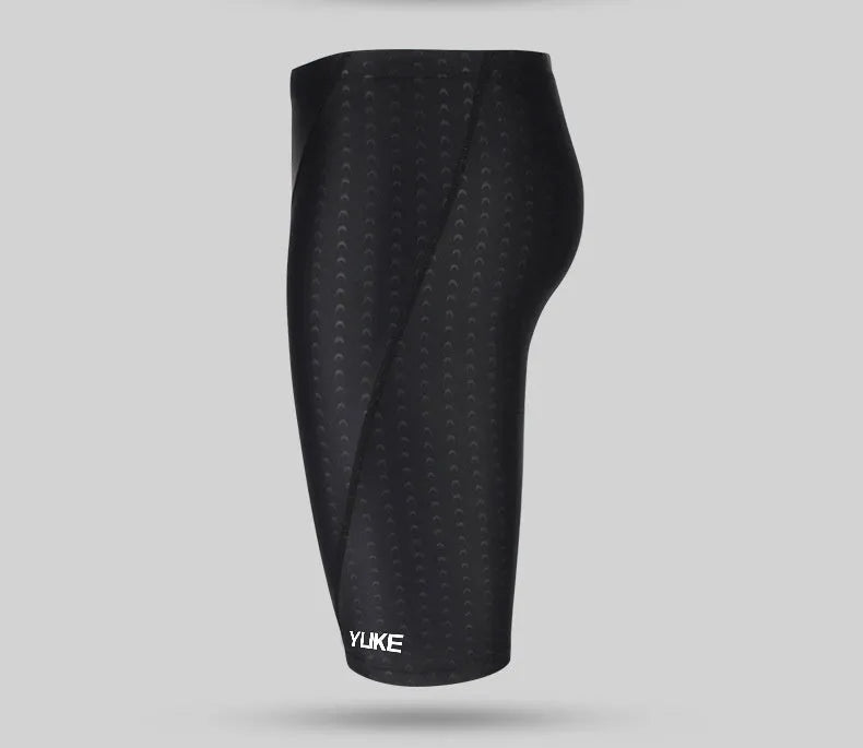 Men's black five-piece swimming set with trunks, goggles, waterproof cap, earplugs, nose clip, and carry bag.