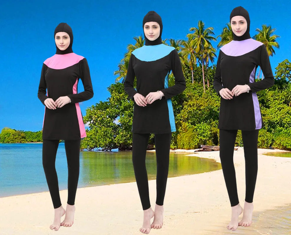 Conservative black women's swimsuit with long sleeves, a hood, and matching pants.
