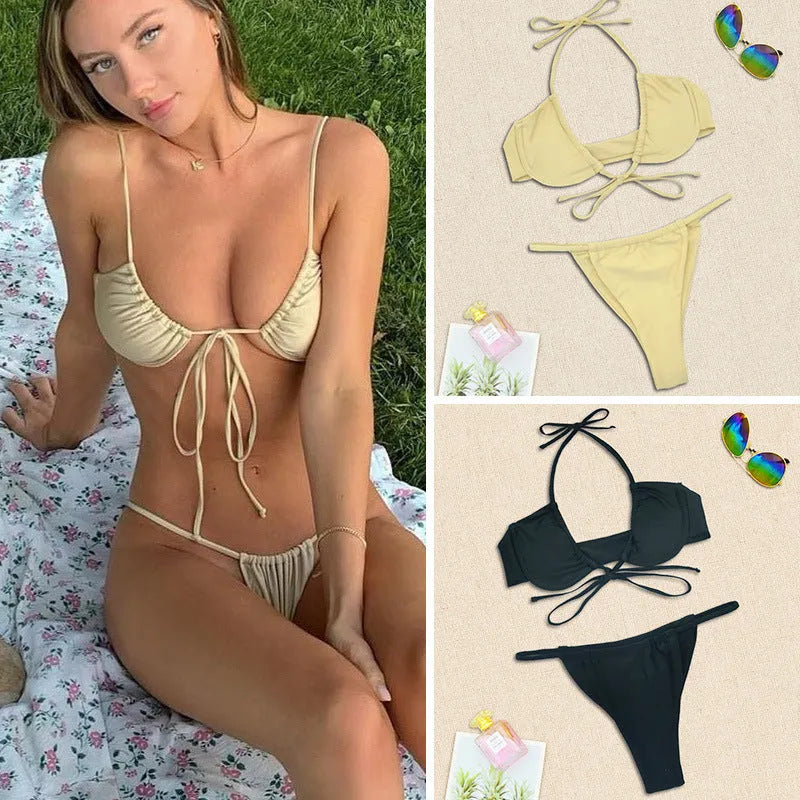 Black and mint green women's two-piece nylon bikini swimsuit on hanger