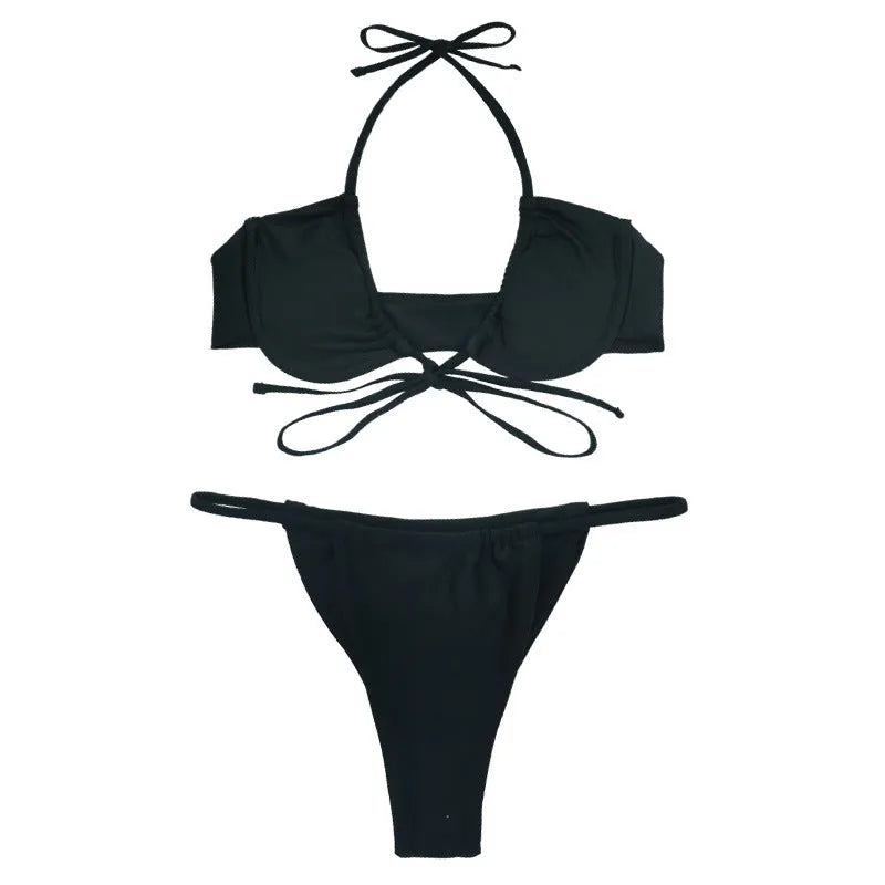 Black and mint green women's two-piece nylon bikini swimsuit on hanger