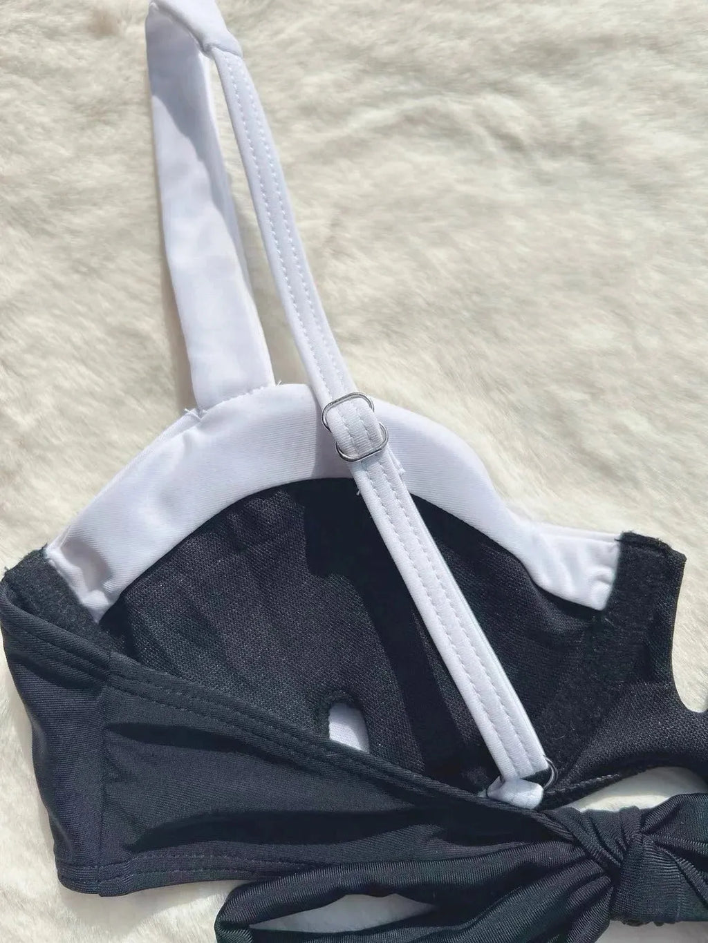 Black low waist women's bikini with stitching split briefs design