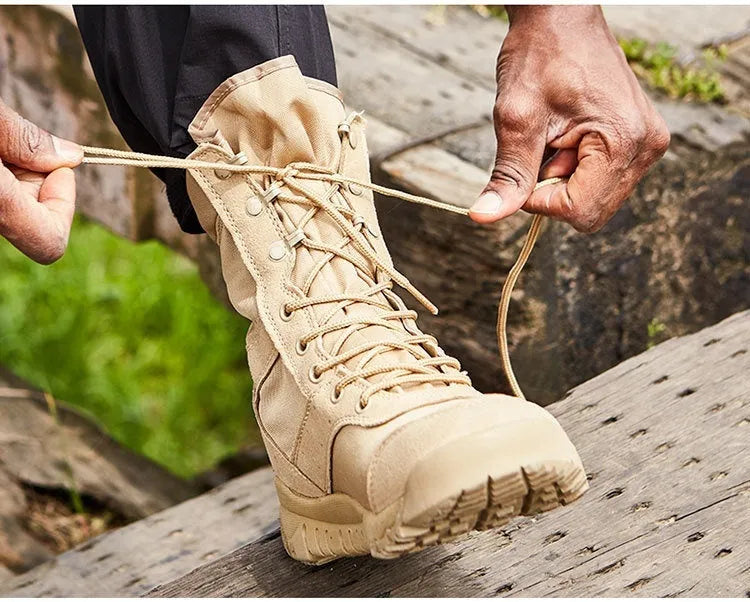 Yulong tactical desert combat boots in black and sand colour on a white background.