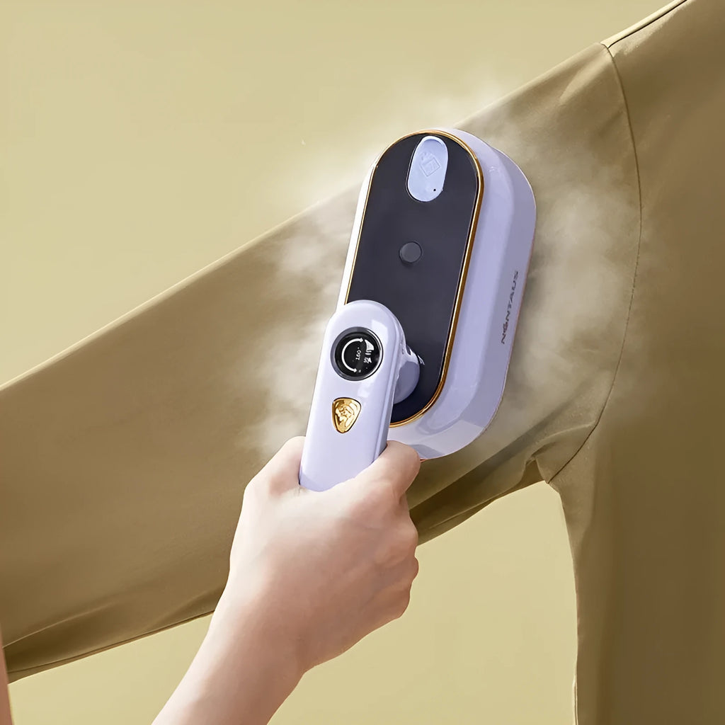 Portable foldable steam iron in light purple colour with ceramic base plate and international voltage compatibility