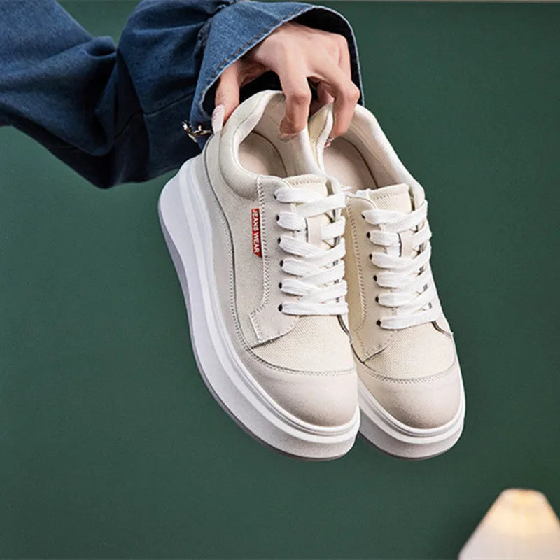 Women's beige leather board shoes with a thick sole, shown from a side angle on a neutral background.