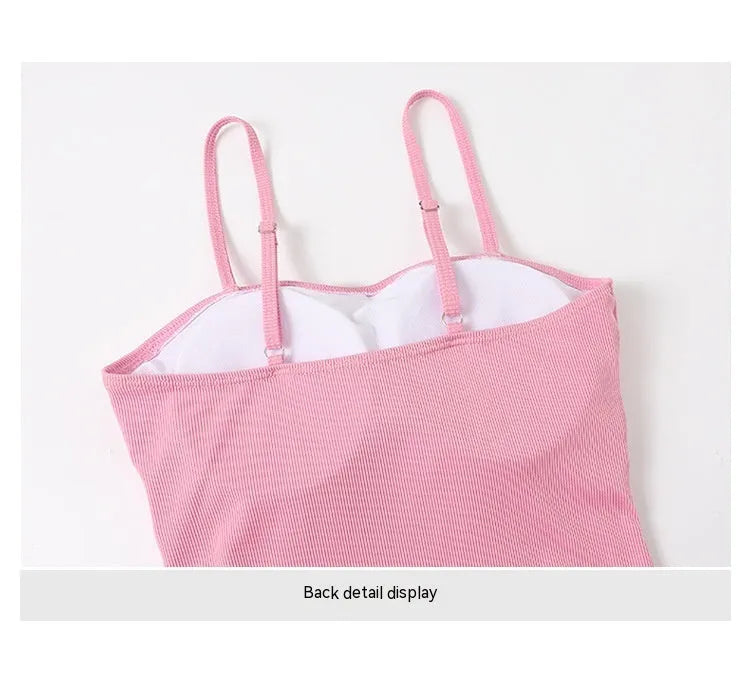 Women's long-sleeved one-piece swimsuit in polyester fibre available in pink and black colours
