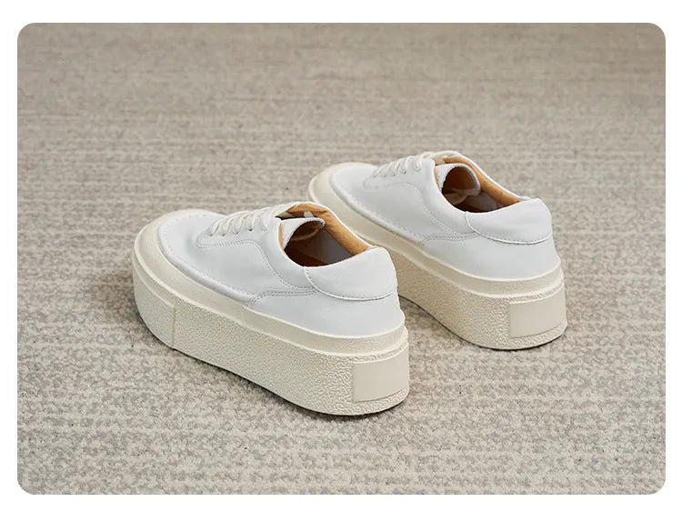 Women's black platform casual shoes with embossed cowhide leather upper and rubber sole