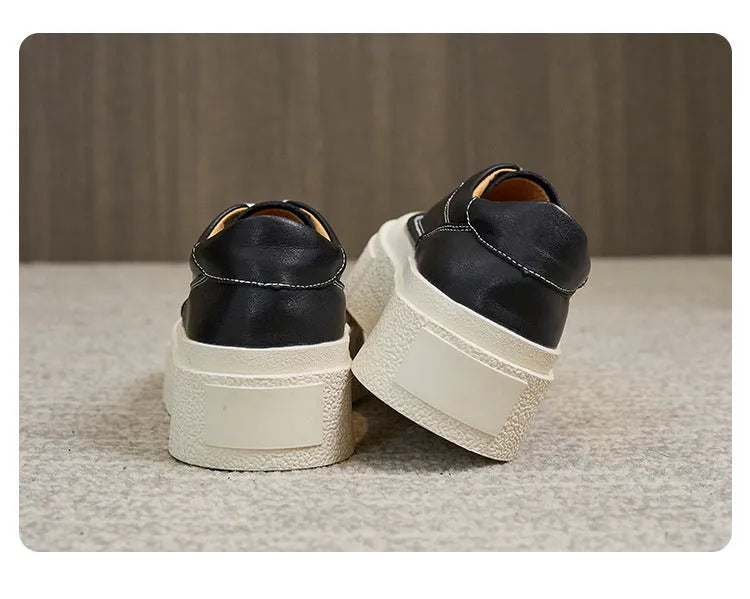 Women's black platform casual shoes with embossed cowhide leather upper and rubber sole