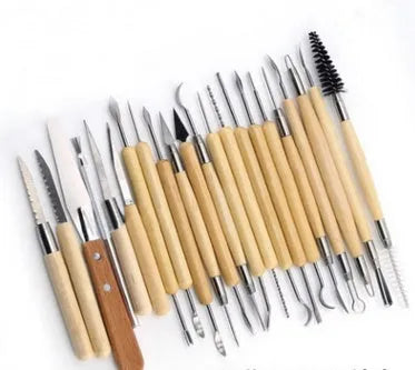 27-piece pottery clay sculpting tool set with stainless steel, wood, and plastic implements in roll-up storage bag