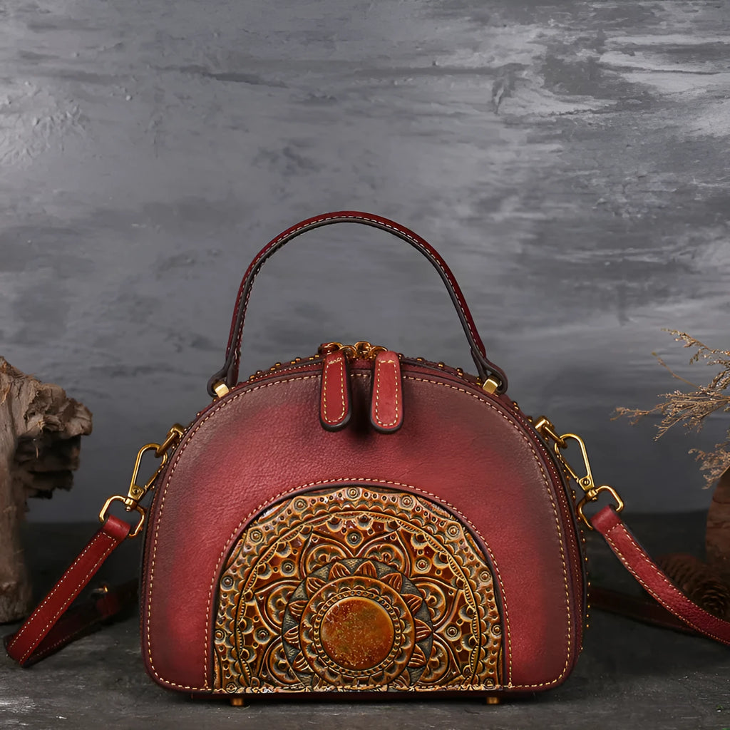 Vintage suede cowhide leather handbag showing interior mobile phone compartment, ID pocket, and laminated zipper pocket