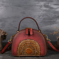 Vintage suede cowhide leather handbag showing interior mobile phone compartment, ID pocket, and laminated zipper pocket