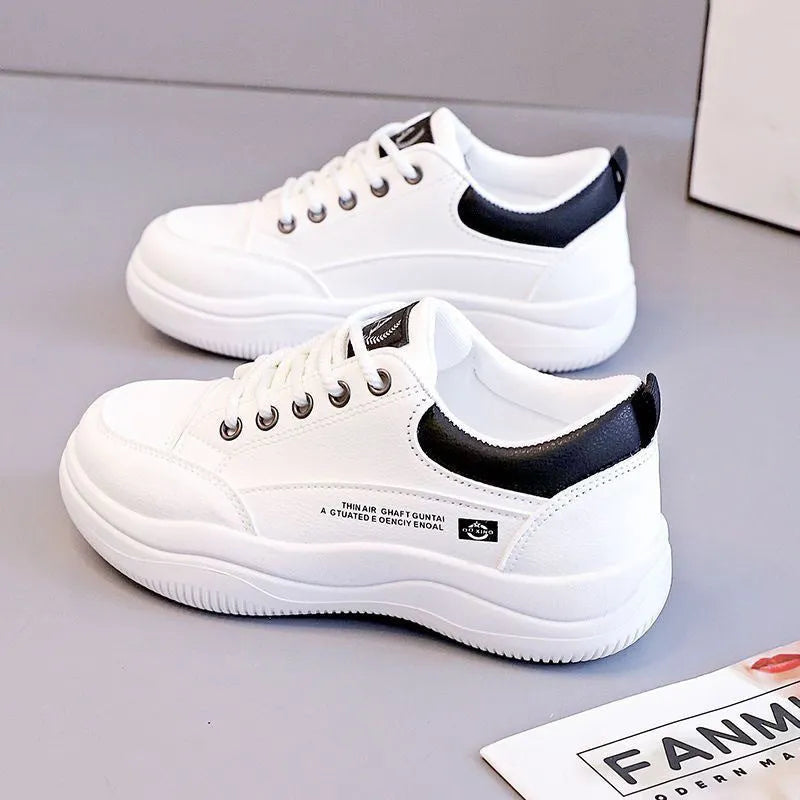Women's white Korean-style lace-up shoes with cross-strap detailing and round toe