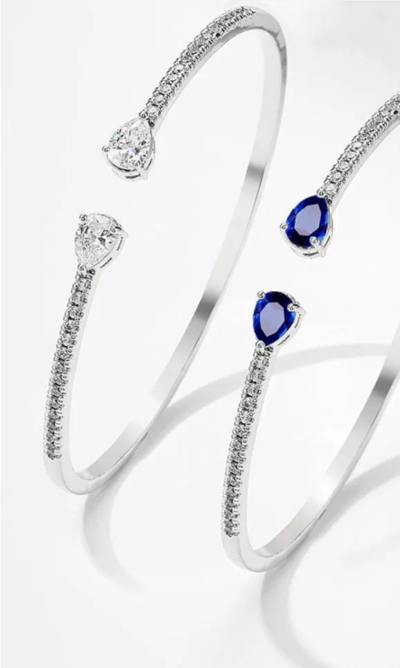 Multi-zircon personalised bracelet with inlaid detailing on copper in blue and white options