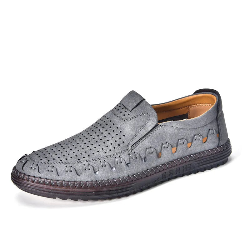 Men's brown slip-on casual shoes with round toe and visible sewing construction on artificial PU upper