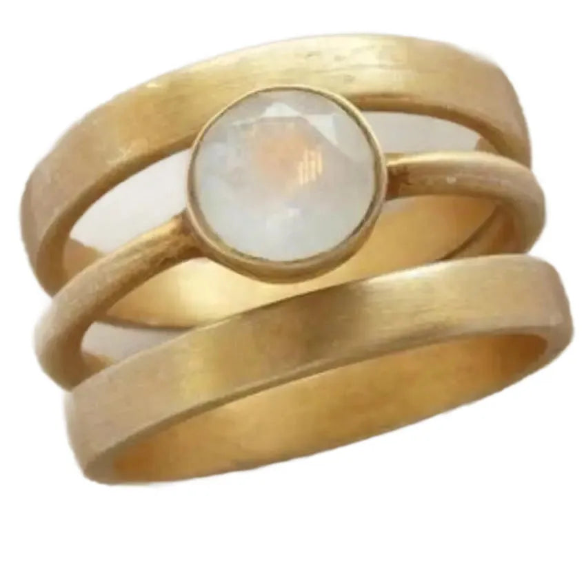 Gold titanium steel ring with hollow geometric design and micro-inlaid white chalcedony stone