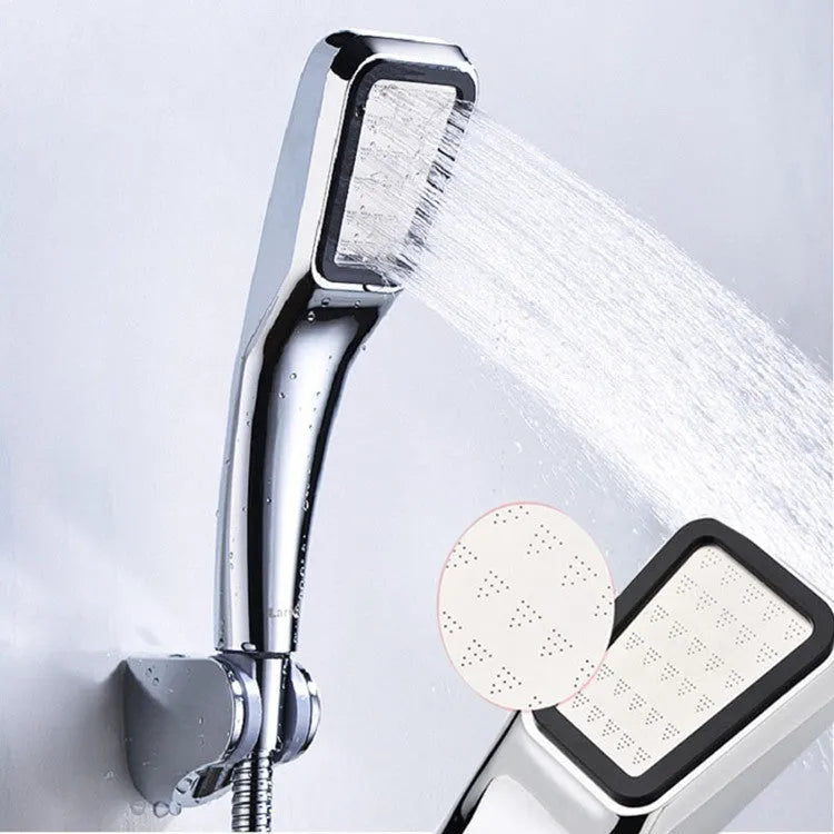 Orange hand-held pressurised shower head with rain function and accessory set