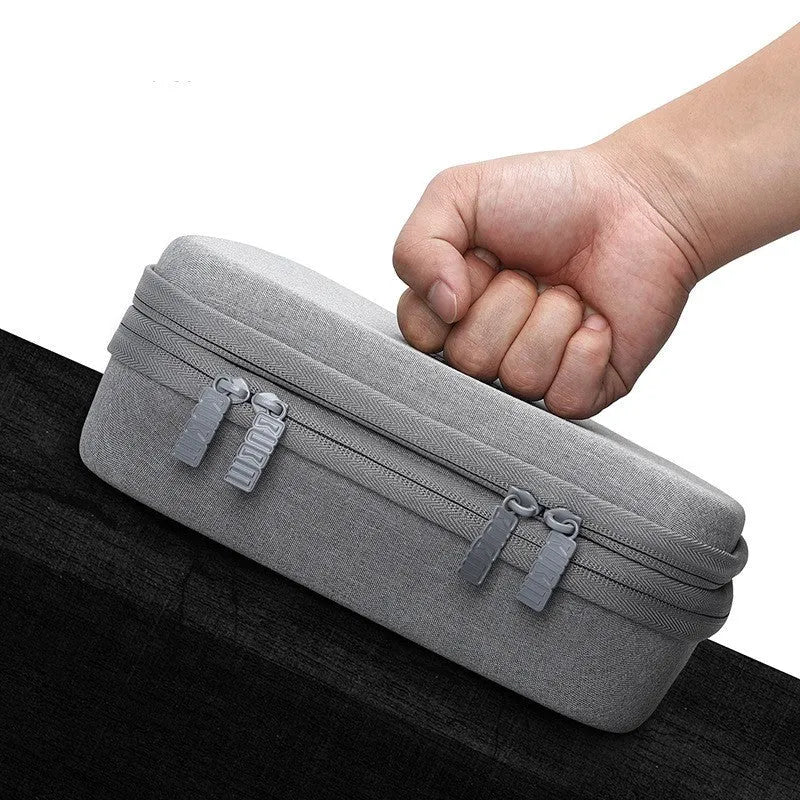 Black and grey EVA digital storage bag organiser for headphones and cables.