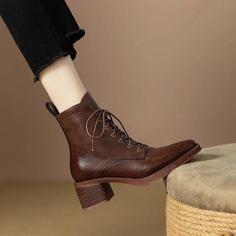 Women's black pointed-toe short tube boots with 5.5cm heel and artificial PU upper