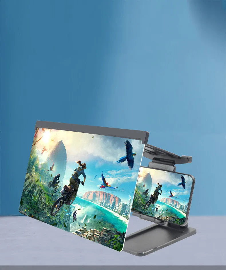 Black folding mobile phone screen amplifier with detachable phone holder on desktop