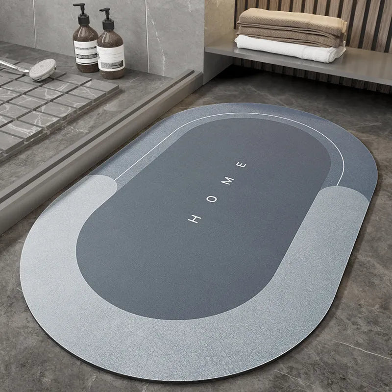 Bathroom floor mat in blue colour, oval shape, showing machine-woven blended texture