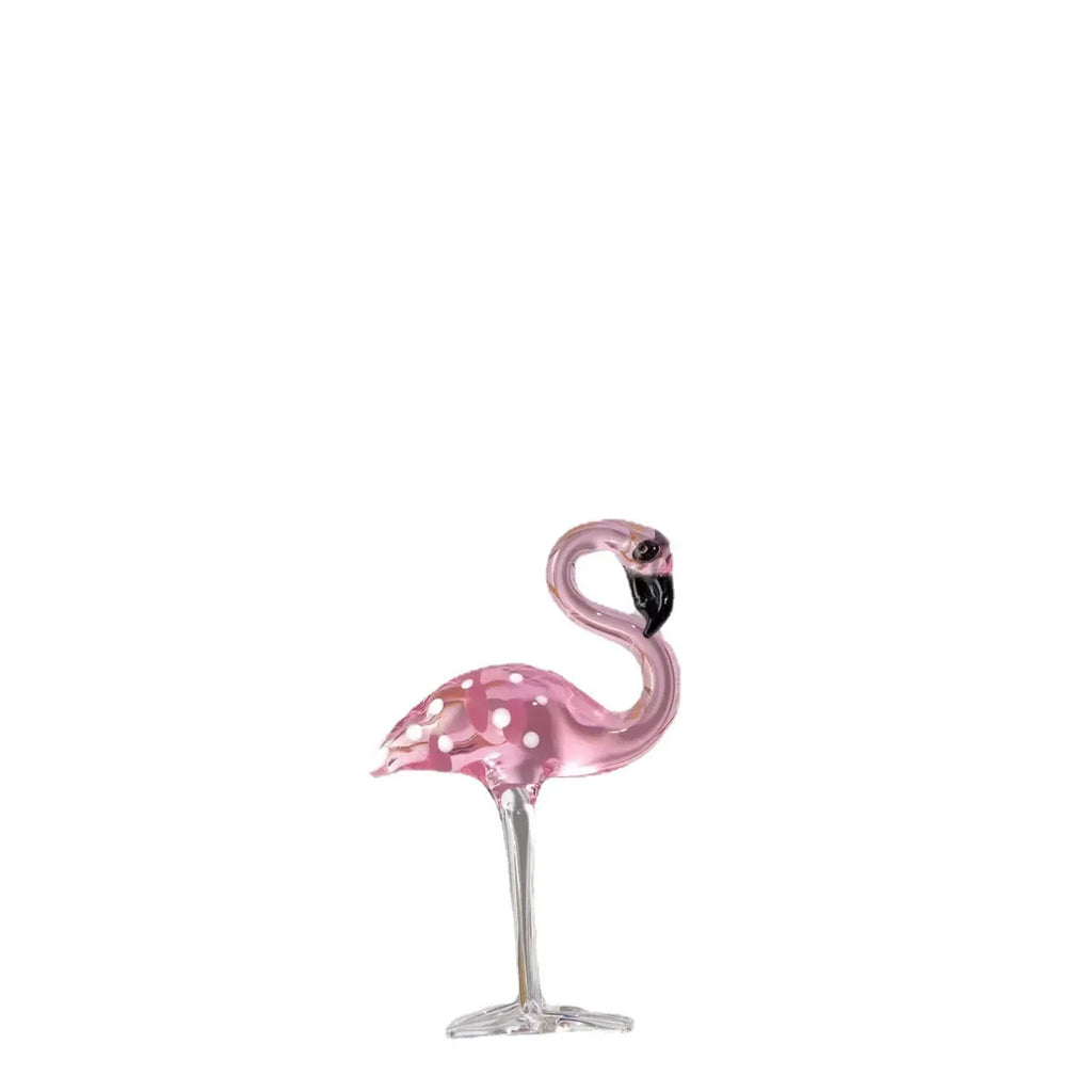 Pink crystal flamingo decorative ornament on table with modern minimalist style