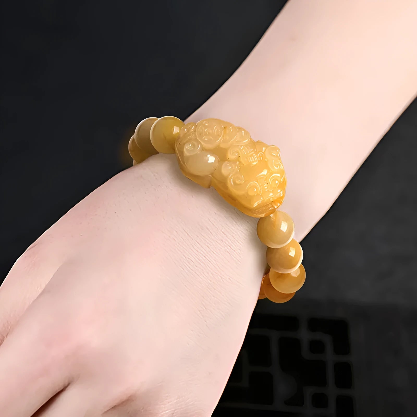 Golden Thread Jade money bracelet carved from Jinsi Jade showing large and small size options