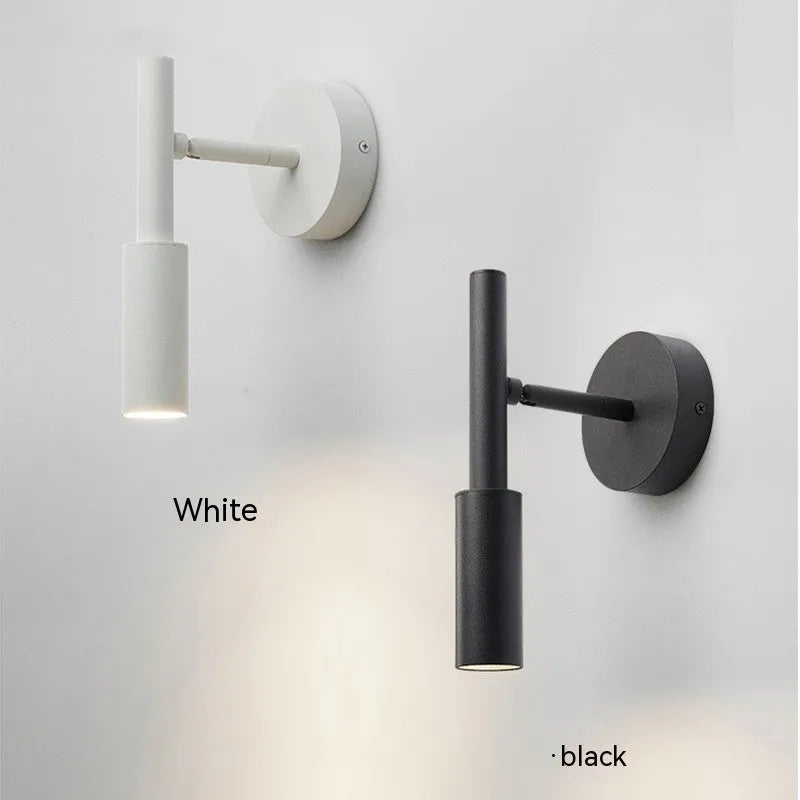 Black wrought iron modern wall light with three colour lighting options