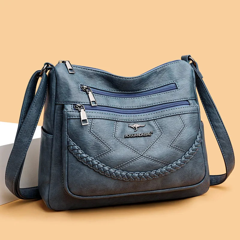 Soft leather women's shoulder bag in horizontal square design with crossbody strap