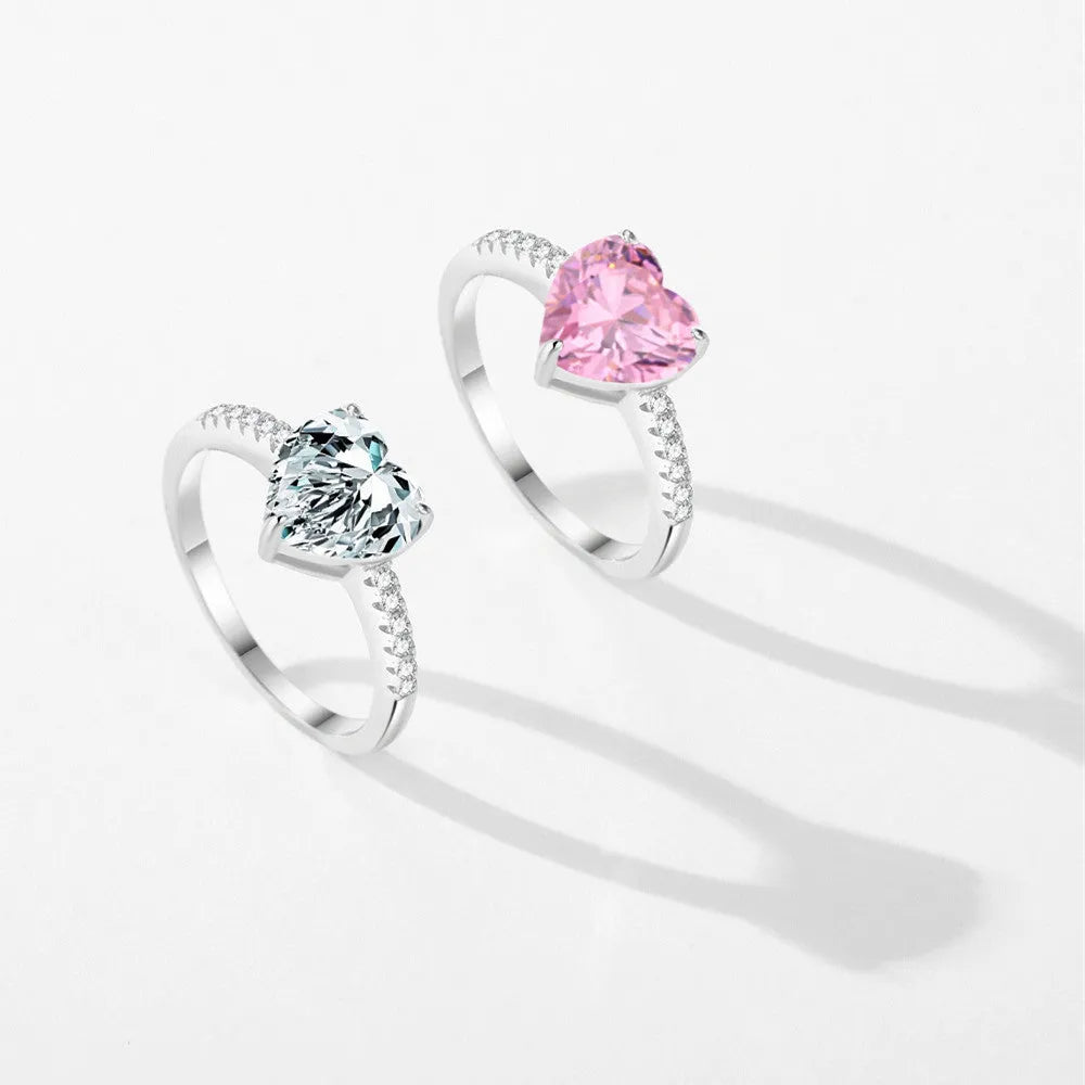 Women's sterling silver love ring with heart-shaped zircon stone in white color on display