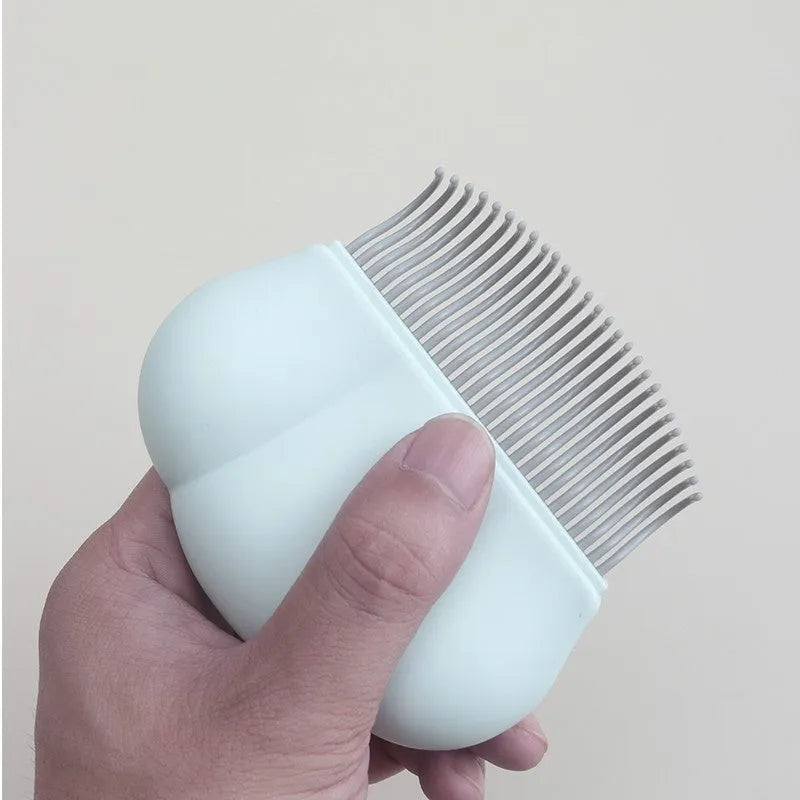 Blue Paw Soft deshedding brush for cats and dogs on a white background