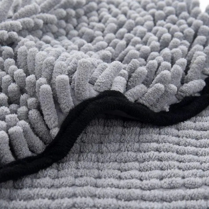 Pet bath towel for dogs and cats measuring 62cm by 23cm in fibre absorbent material