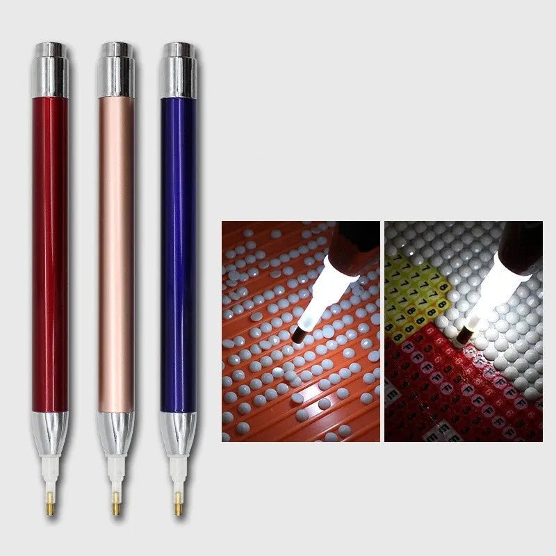 Luminous single-head diamond painting drill pen in gold, red, or blue with metal frame.