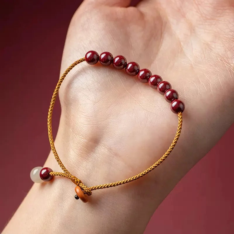 Hand-woven cinnabar bracelet with geometric beads in traditional Hetian jade style