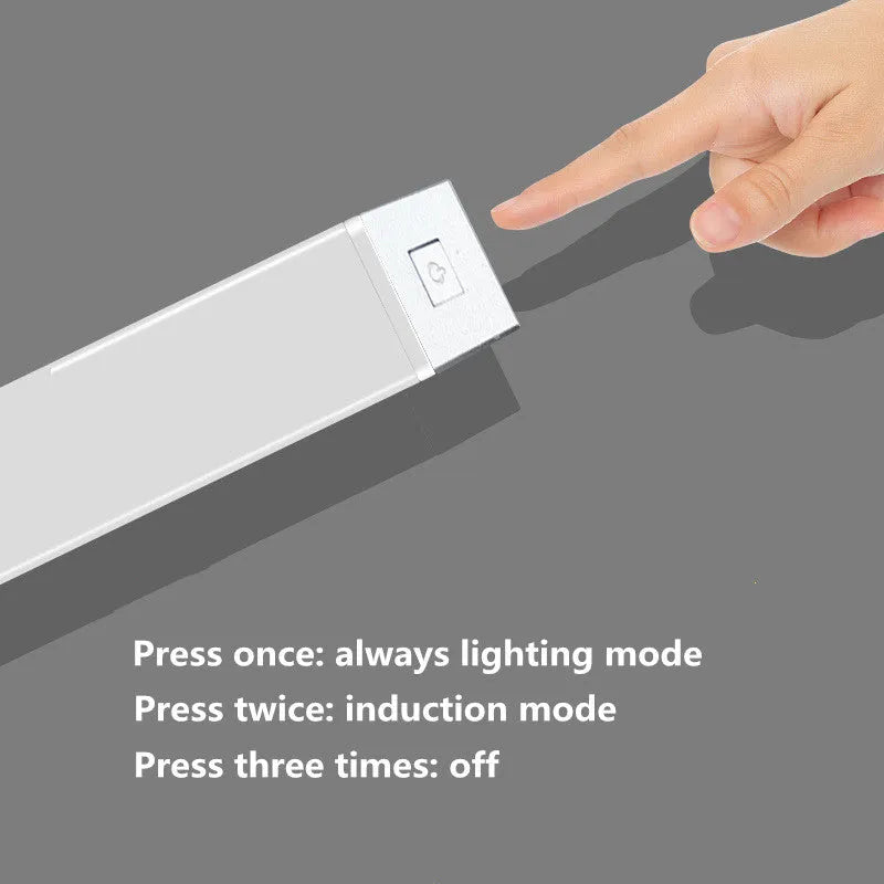 Silver aluminium USB rechargeable LED strip light with magnetic back for wardrobes.