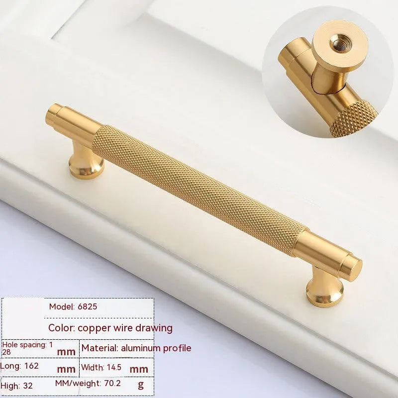 Aluminium furniture handle with brushed brass finish showing European style design