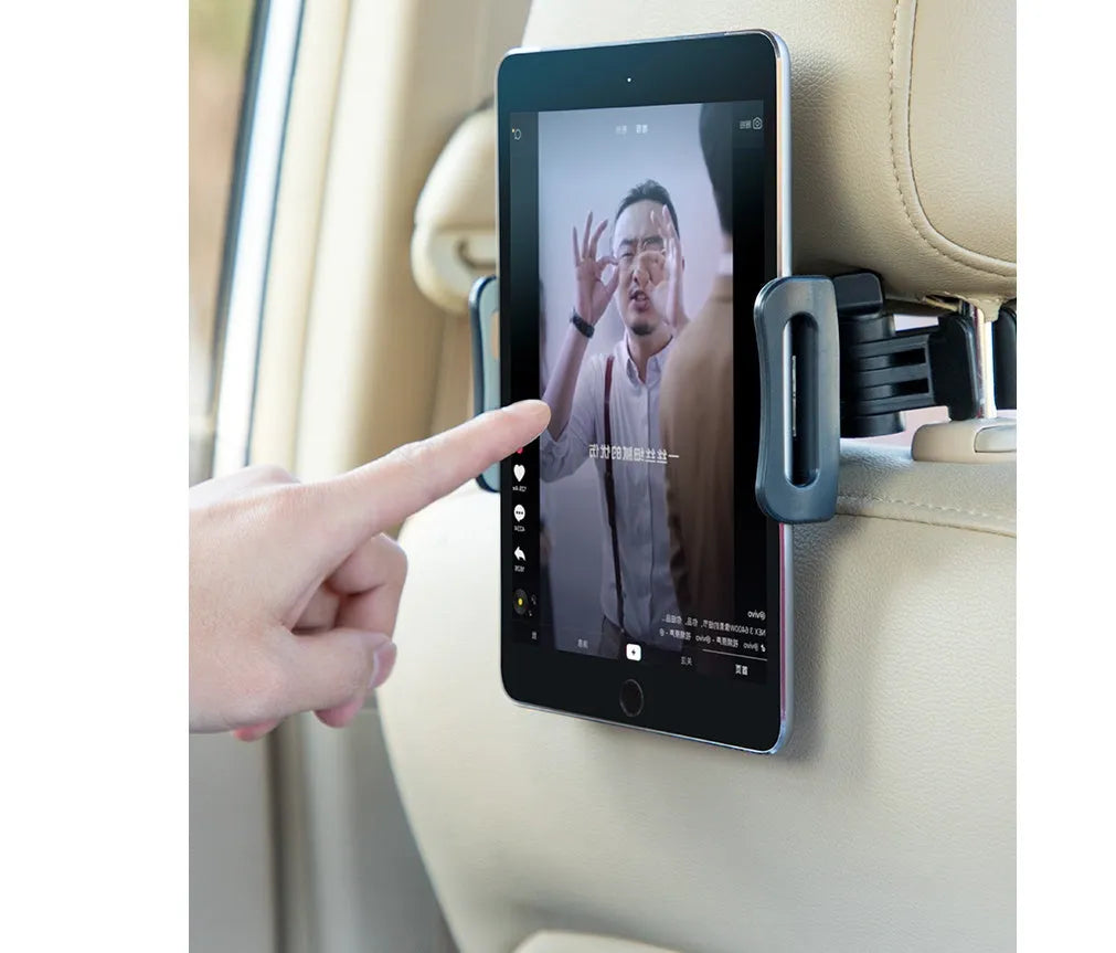 Black universal car phone and tablet holder with adjustable arm mounted on a rear seat base.