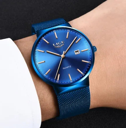 Men's stainless steel watch with 40mm dial on a strap, shown in black, blue, and two-tone colour variations.