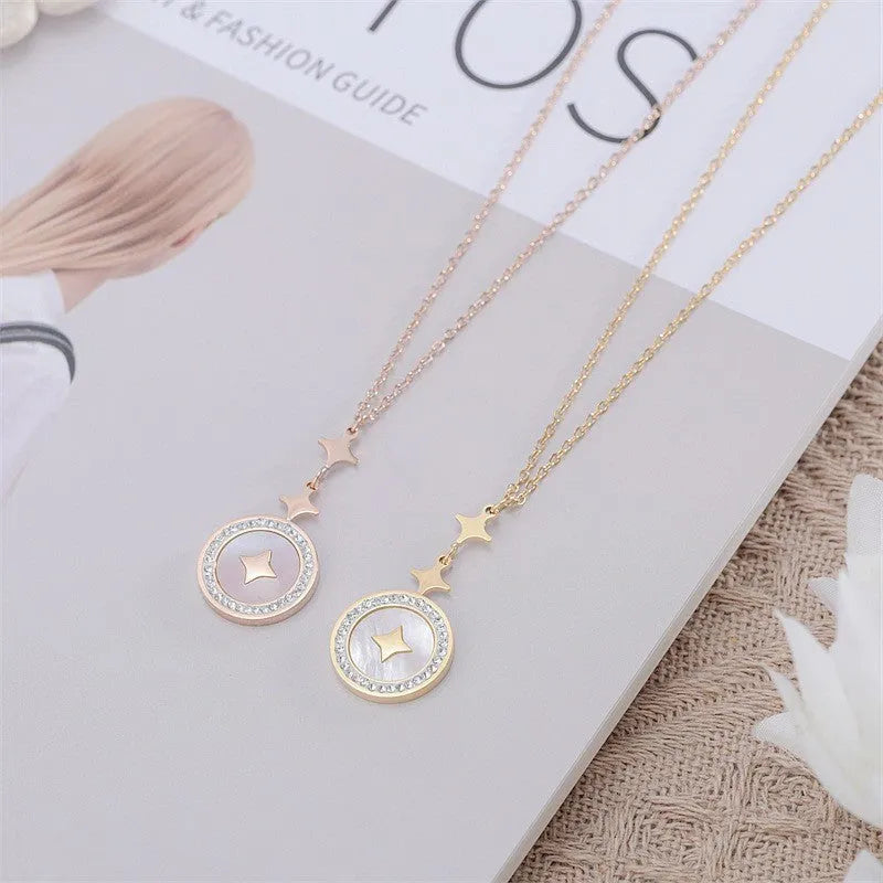 Titanium steel necklace with six-pointed star pendant on O-ring chain in gold finish