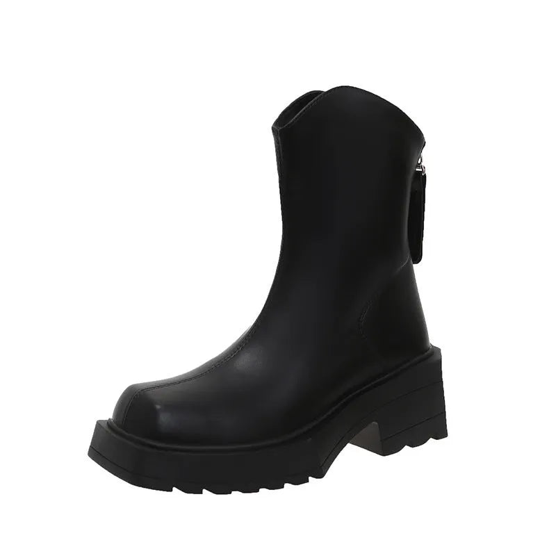 Black women's platform Martin boots with a square toe and back zipper on a neutral background.