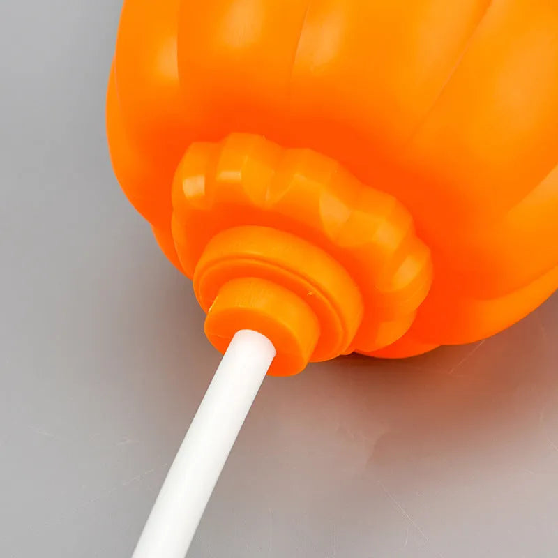 USB-powered plastic pumpkin decorative lamp showing yellow or purple light option