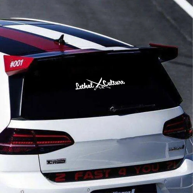 Yellow and white car rear windshield sticker with letters and numbers in two size options.