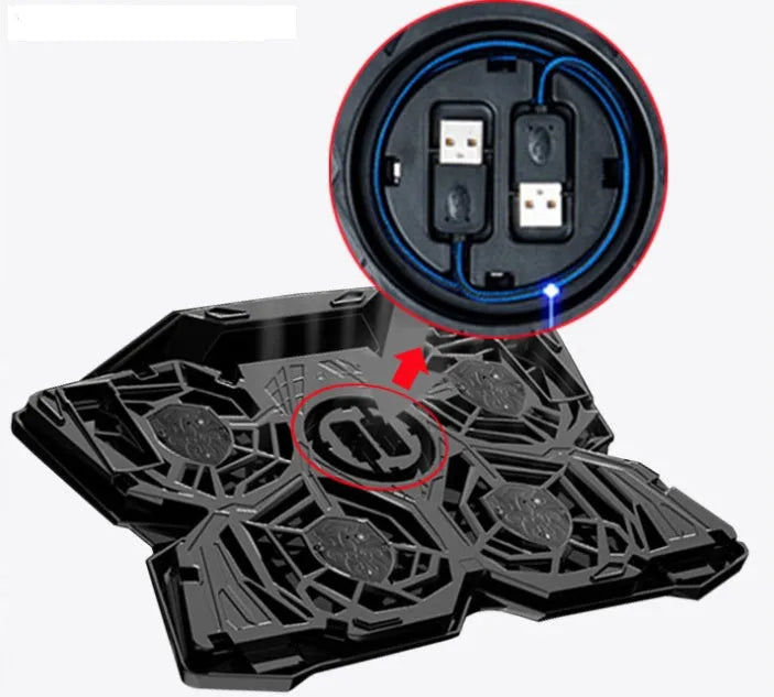 Blue laptop cooling pad with four illuminated fans, two USB ports, and speed control switches on a desk.